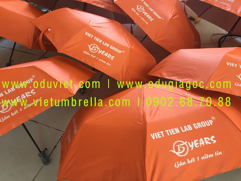 xưởng sản xuất ô dù cầm tay in logo quảng cáo